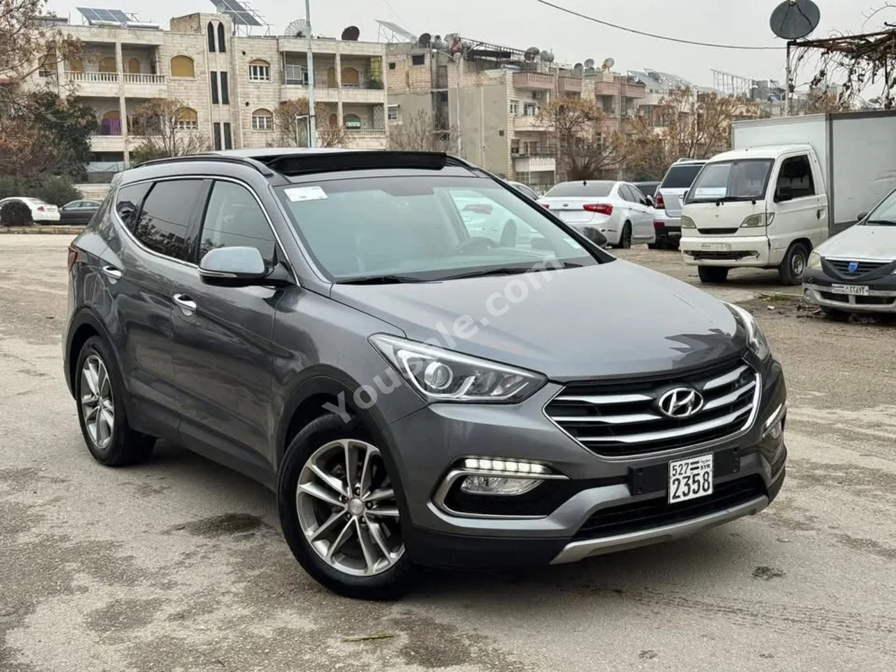 Hyundai  Santa Fe  2016  Automatic  153,000 km  4 Cylinder  AWD  SUV  Gray  Diesel