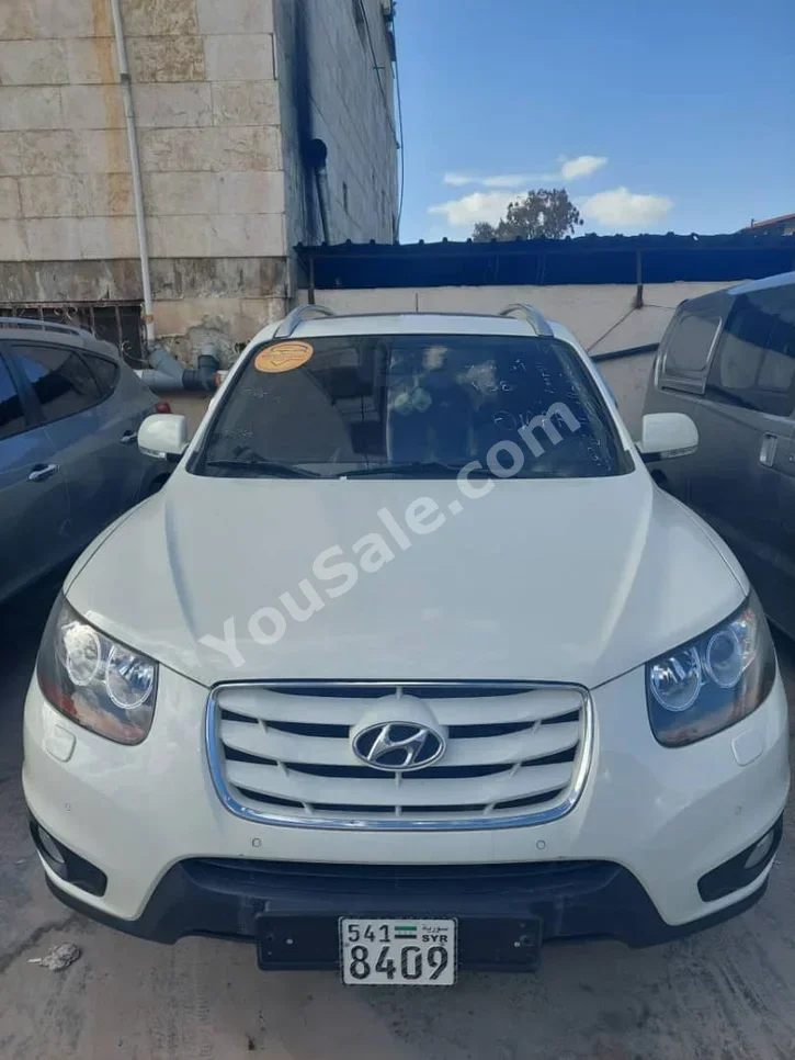 Hyundai  Santa Fe  2011  Automatic  187,000 km  4 Cylinder  FWD  SUV  White  Diesel