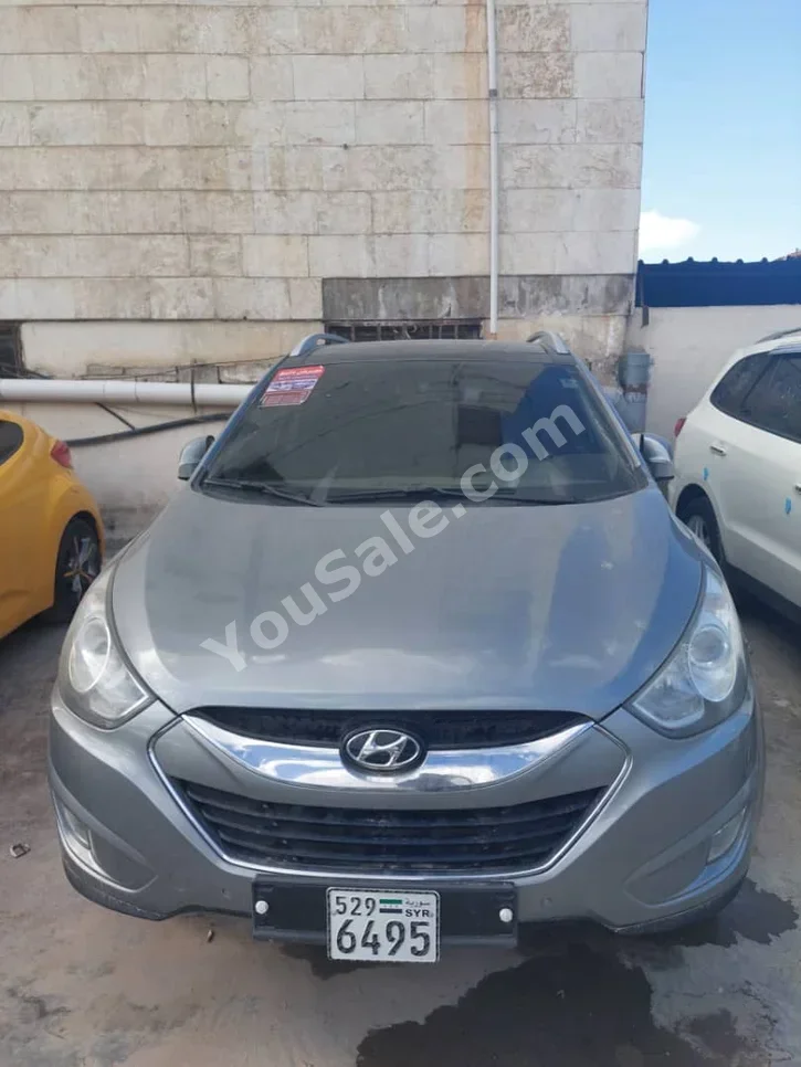 Hyundai Tucson 2011 Automatic 178,000 km 4 Cylinder FWD SUV Gray Gasoline