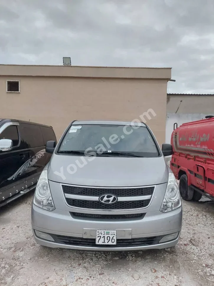 Hyundai  Van H1  2014  Automatic  194,000 km  4 Cylinder  RWD  Van / Bus  Silver  Diesel