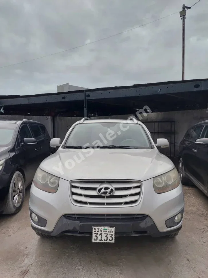 Hyundai Santa Fe 2009 Automatic 152,000 km 4 Cylinder FWD SUV Silver Diesel