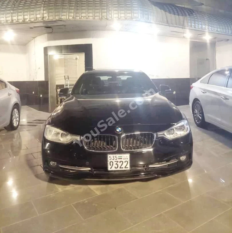 BMW  3-Series  328i  2016  Automatic  125,000 km  6 Cylinder  4WD  Sedan  Black  Gasoline