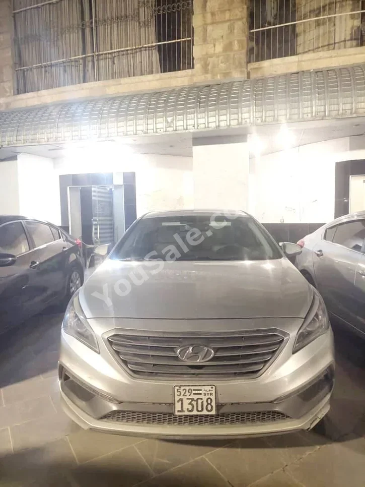 Hyundai  Sonata  2016  Automatic  115,000 km  4 Cylinder  FWD  Sedan  Silver  Gasoline
