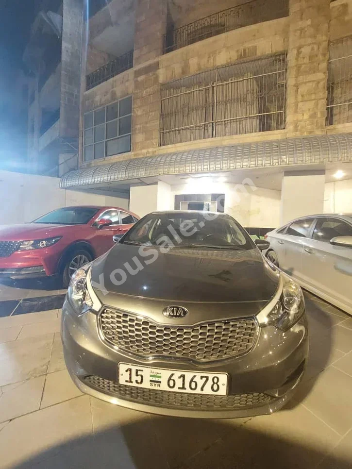 Kia K3 2013 Automatic 104,000 km 4 Cylinder FWD Sedan Dark Gray Gasoline