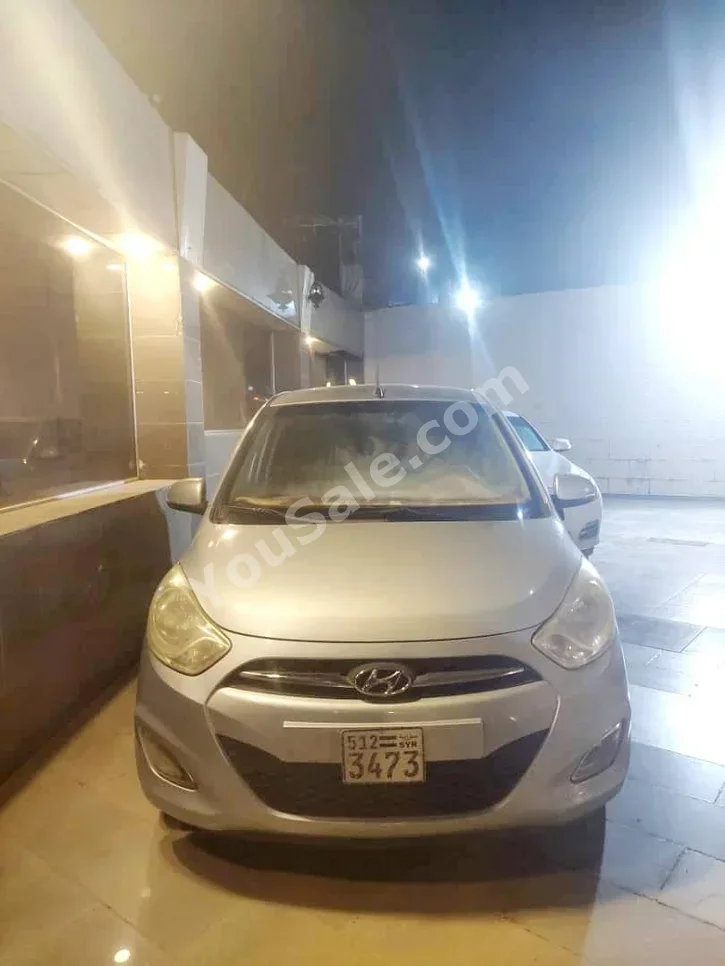 هيونداي اي 10 2006 اتوماتيك 185,000 كم 4 سلندر دفع أمامي هاتشباك فضي بنزين