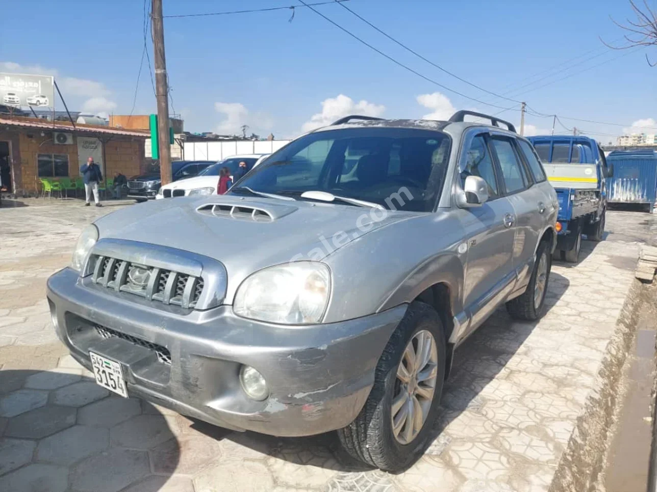هيونداي سانتا في 2002 اتوماتيك 216,000 كم 4 سلندر دفع أمامي اس يو في فضي ديزل