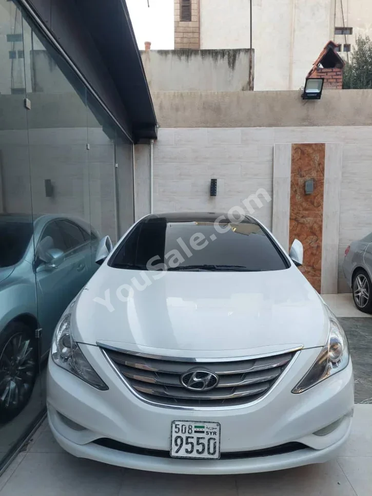 Hyundai  Sonata  2012  Automatic  160,000 km  4 Cylinder  FWD  Sedan  White  Gasoline