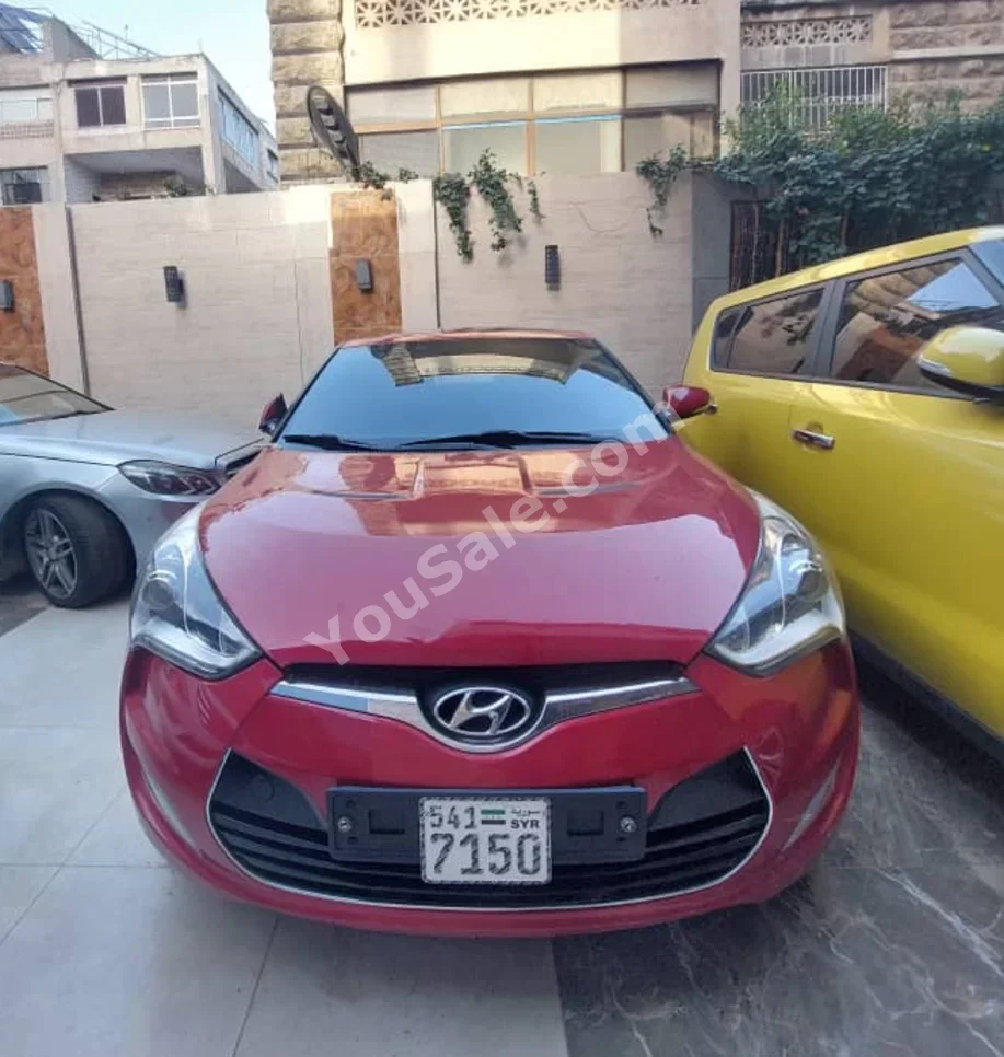 Hyundai  Veloster  2012  Automatic  155,000 km  4 Cylinder  FWD  Coupe / Sport  Red  Gasoline