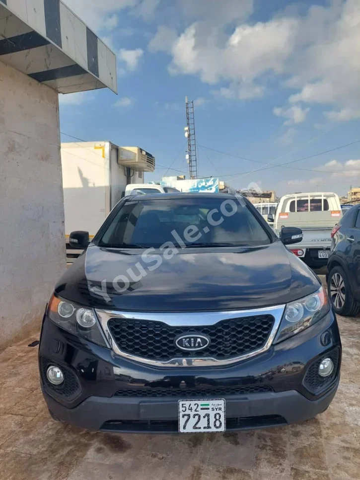 Kia  Sorento  2010  Automatic  164,000 km  4 Cylinder  FWD  SUV  Black  Diesel