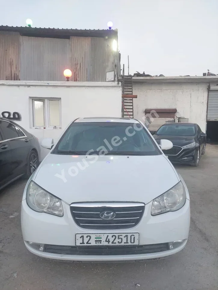 هيونداي افانتي 2008 عادي 250,000 كم 4 سلندر دفع أمامي سيدان أبيض بنزين