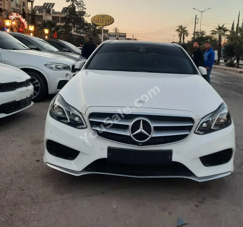 Mercedes-Benz  E-Class  300  2016  Automatic  108,000 km  6 Cylinder  RWD  Sedan  White  Gasoline