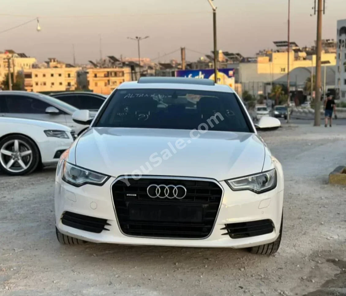 Audi  A6  3.0  2012  Automatic  185,000 km  6 Cylinder  RWD  Sedan  White  Gasoline