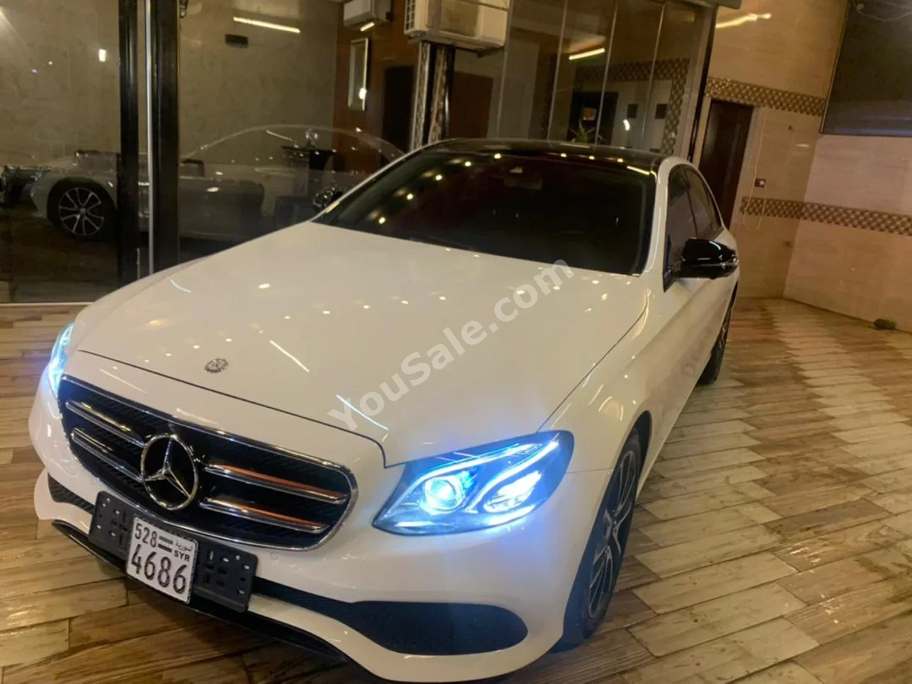 Mercedes-Benz  E-Class  300  2017  Automatic  94,000 km  4 Cylinder  RWD  Sedan  White  Gasoline