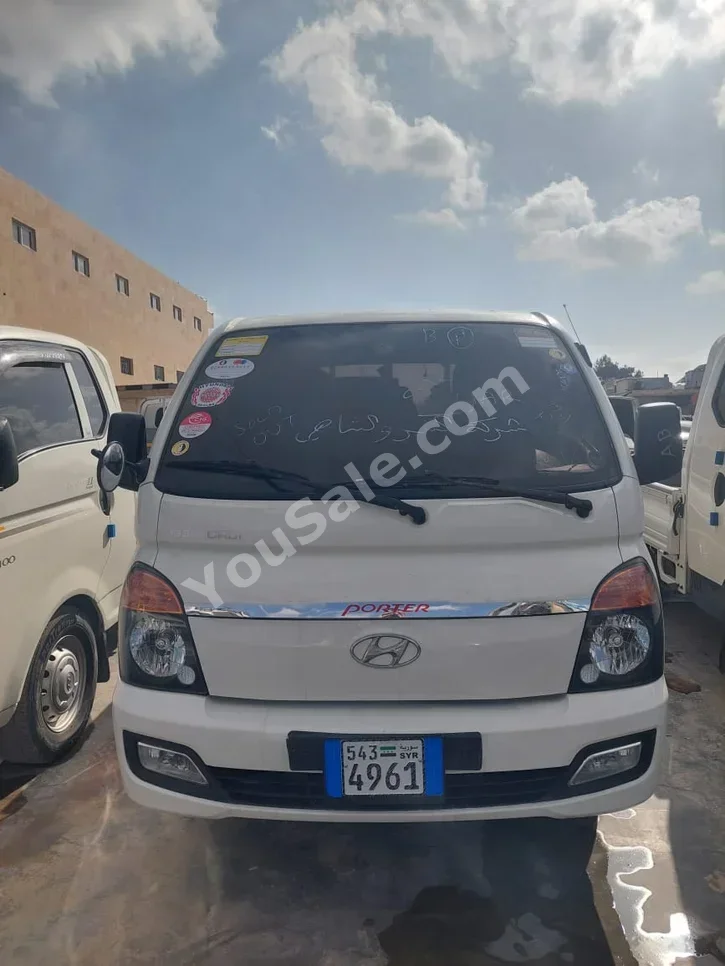 Hyundai  Porter  Porter  2012  Manual  154,000 km  4 Cylinder  RWD  Pick Up  White  Diesel