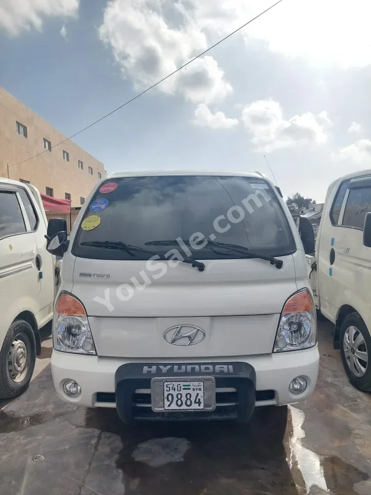 Hyundai Porter Porter 2009 Manual 125,000 km 4 Cylinder RWD Pick Up White Diesel