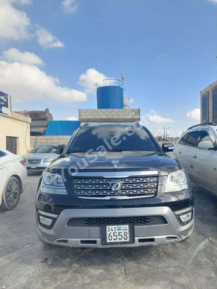 كيا موهافي 2009 اتوماتيك 135,000 كم 6 سلندر دفع خلفي اس يو في أسود ديزل