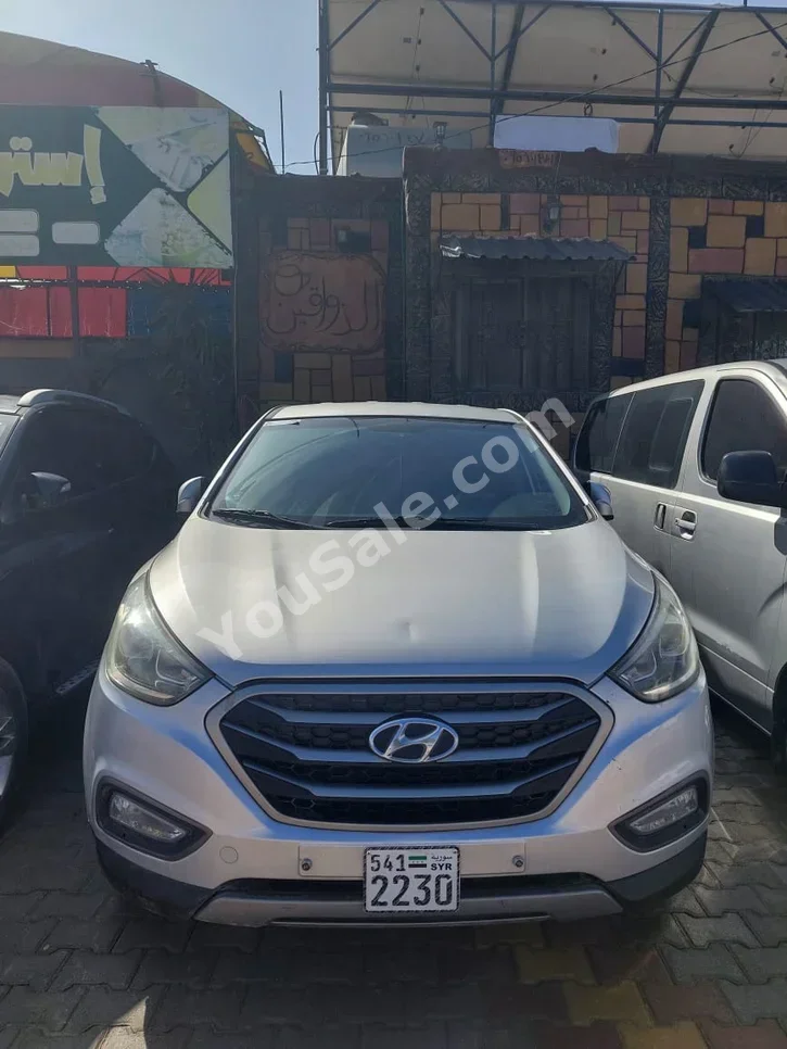 Hyundai  Tucson  2014  Automatic  134,000 km  4 Cylinder  FWD  SUV  Silver  Diesel