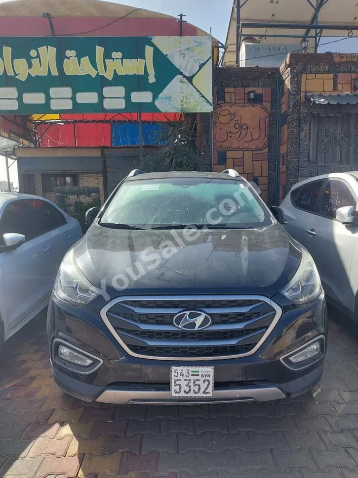 Hyundai  Tucson  2014  Automatic  125,000 km  4 Cylinder  FWD  SUV  Black  Diesel
