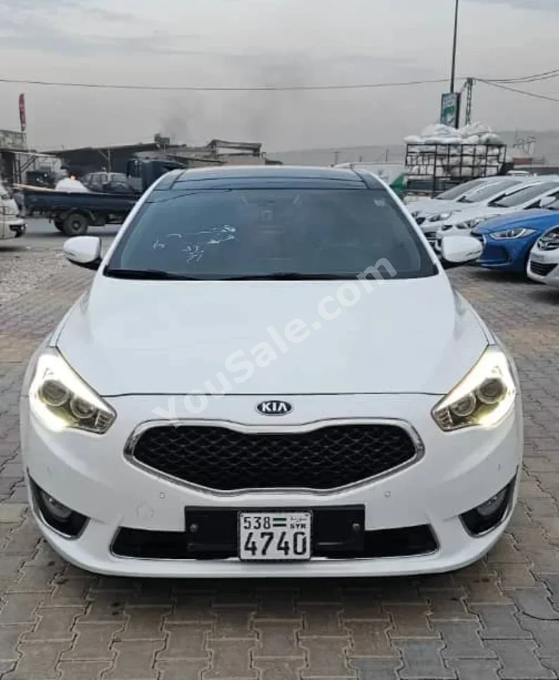 Kia  K7  2014  Automatic  196,000 km  4 Cylinder  FWD  Sedan  White  Gasoline