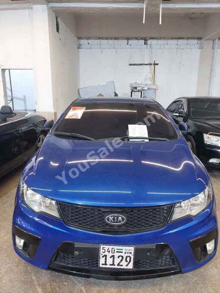 Kia  Forte  2013  Automatic  170,000 km  4 Cylinder  FWD  Coupe / Sport  Blue  Gasoline