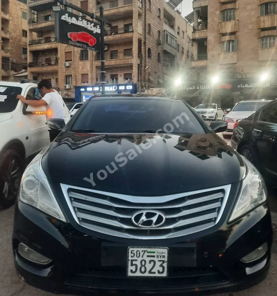 Hyundai Grandeur 2012 Automatic 219,000 km 4 Cylinder FWD Sedan Black Gasoline