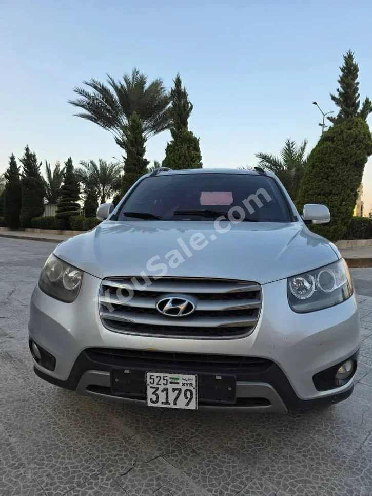 Hyundai  Santa Fe  2012  Automatic  154,000 km  4 Cylinder  FWD  SUV  Silver  Diesel