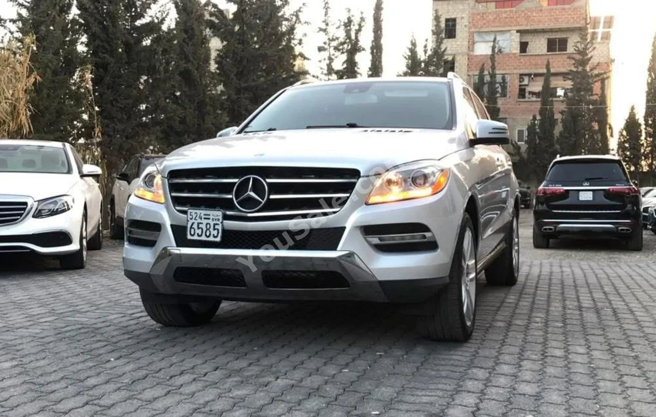 Mercedes-Benz  ML-Class  350  2014  Automatic  150,000 km  6 Cylinder  AWD  SUV  Silver  Gasoline