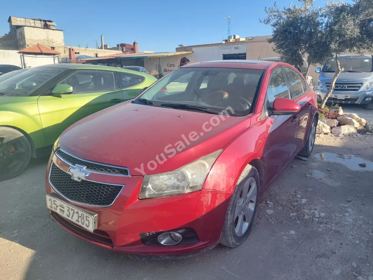 Chevrolet  Cruze  2009  Automatic  142,000 km  4 Cylinder  FWD  Sedan  Red  Gasoline
