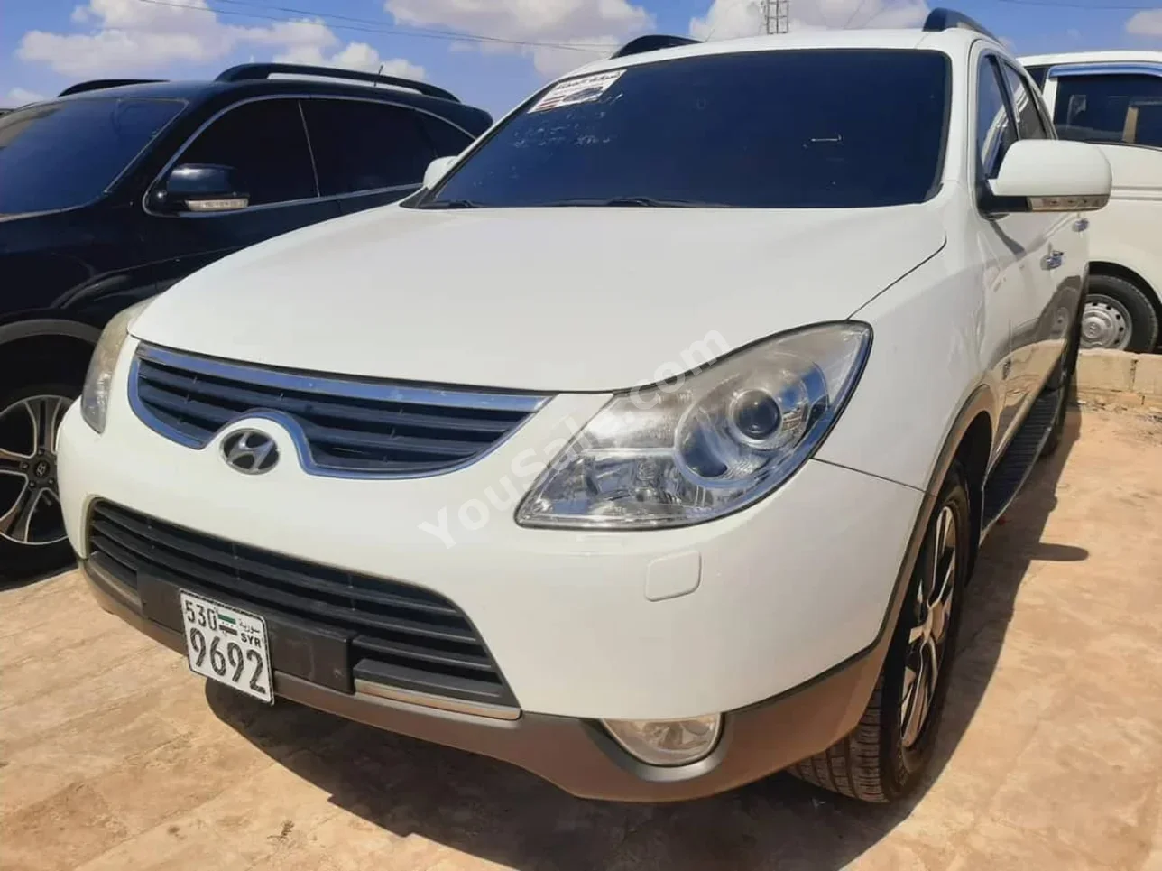Hyundai  Veracruz  2011  Automatic  290,000 km  4 Cylinder  FWD  SUV  White  Diesel