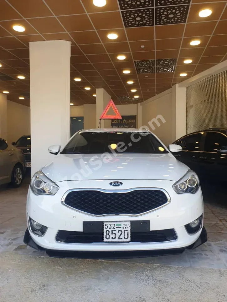 Kia  K7  2014  Automatic  80,000 km  4 Cylinder  FWD  Sedan  White  Gasoline