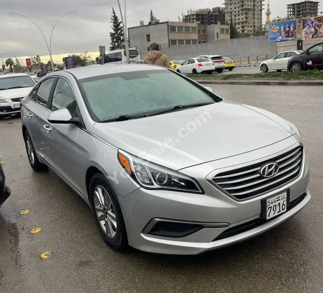 Hyundai  Sonata  2017  Automatic  80,000 km  4 Cylinder  FWD  Sedan  Silver  Gasoline