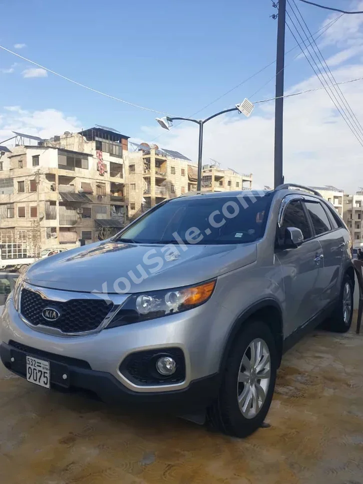 Kia  Sorento  2010  Automatic  123,000 km  4 Cylinder  FWD  SUV  Silver  Gasoline