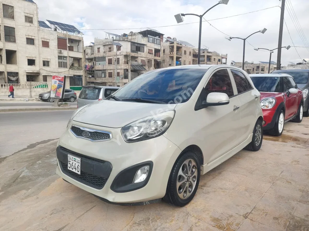 Kia  Picanto  2012  Automatic  125,000 km  4 Cylinder  FWD  Hatchback  Beige  Gasoline