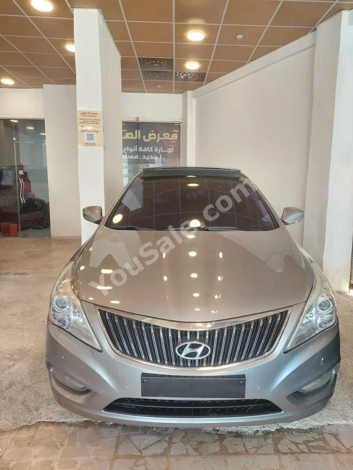 Hyundai Grandeur 2014 Automatic 184,000 km 4 Cylinder FWD Sedan Silver Gasoline