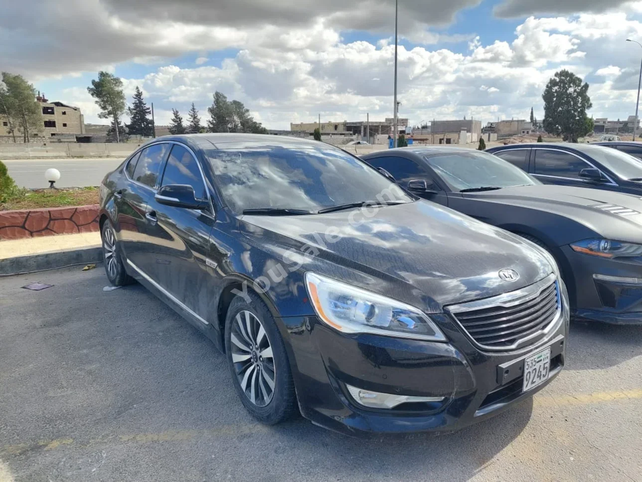 Kia  K7  2012  Automatic  290,000 km  4 Cylinder  FWD  Sedan  Black  Gasoline