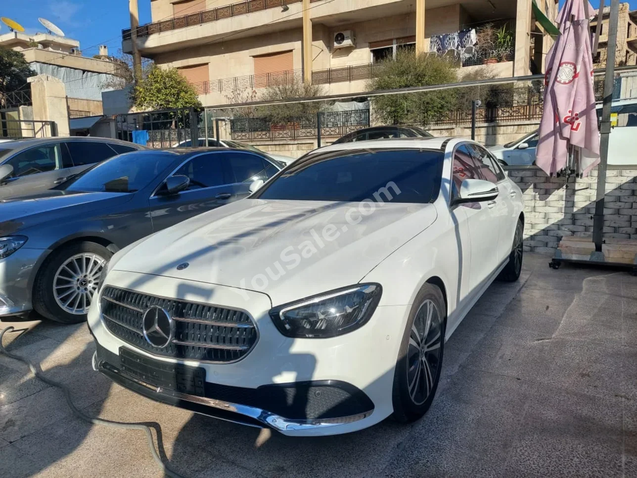 Mercedes-Benz  E-Class  250  2021  Automatic  143,000 km  6 Cylinder  4WD  Sedan  White  Gasoline