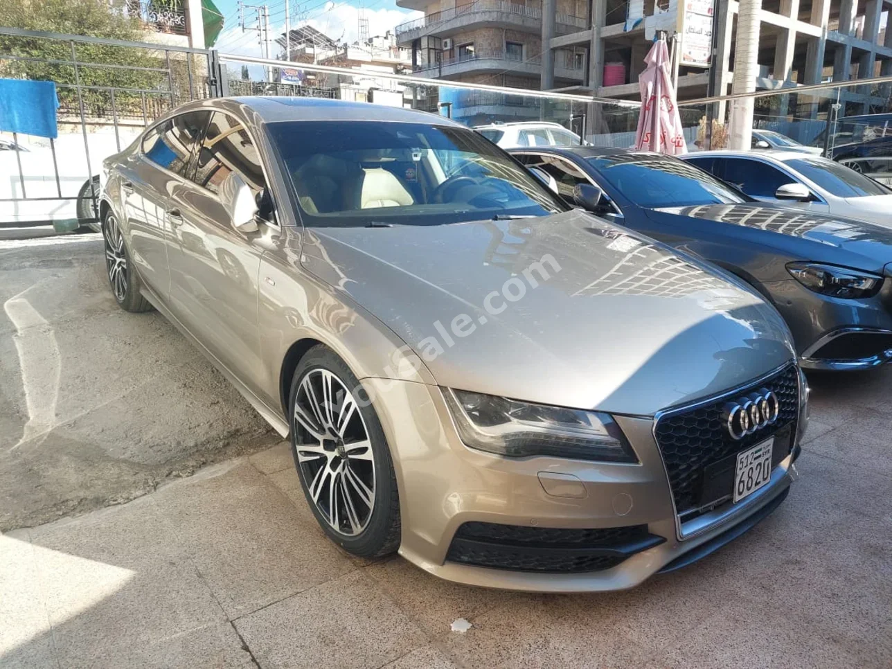 Audi  A7  3.0  2012  Automatic  211,000 km  6 Cylinder  RWD  Sedan  Light Gold  Gasoline