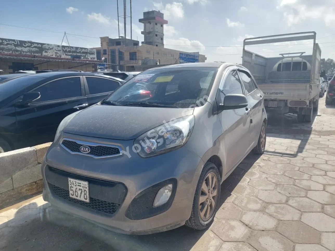 Kia  Picanto  2013  Automatic  85,000 km  4 Cylinder  FWD  Hatchback  Gray  Gasoline