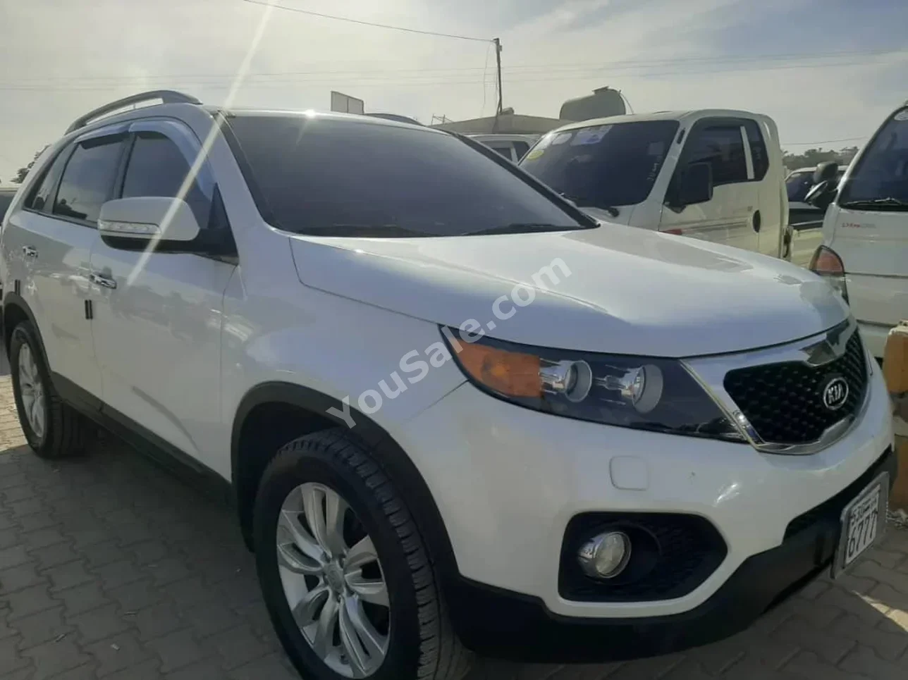 Kia  Sorento  2012  Automatic  138,000 km  4 Cylinder  FWD  SUV  White  Diesel