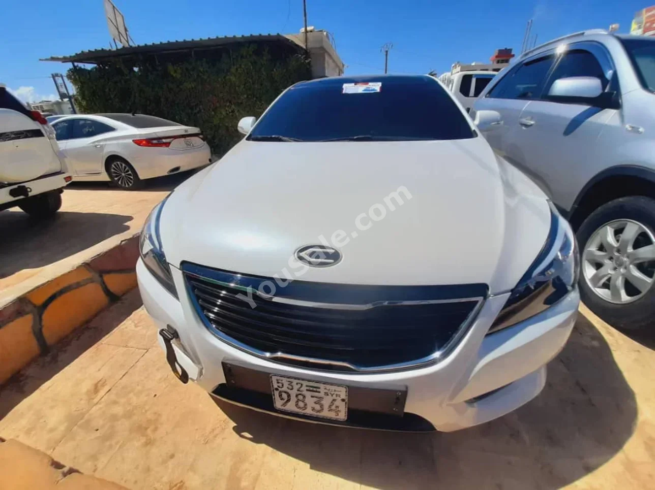 Kia  K7  2010  Automatic  170,000 km  4 Cylinder  FWD  Sedan  White  Gasoline