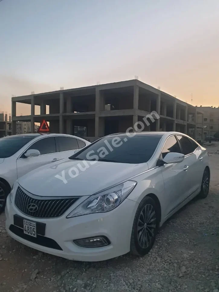 Hyundai Grandeur 2013 Automatic 122,000 km 4 Cylinder FWD Sedan White Gasoline