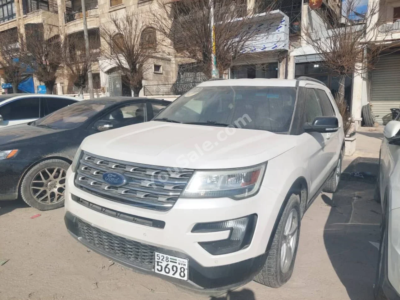 Ford  Explorer  XLT  2016  Automatic  125,000 km  4 Cylinder  FWD  SUV  White  Gasoline