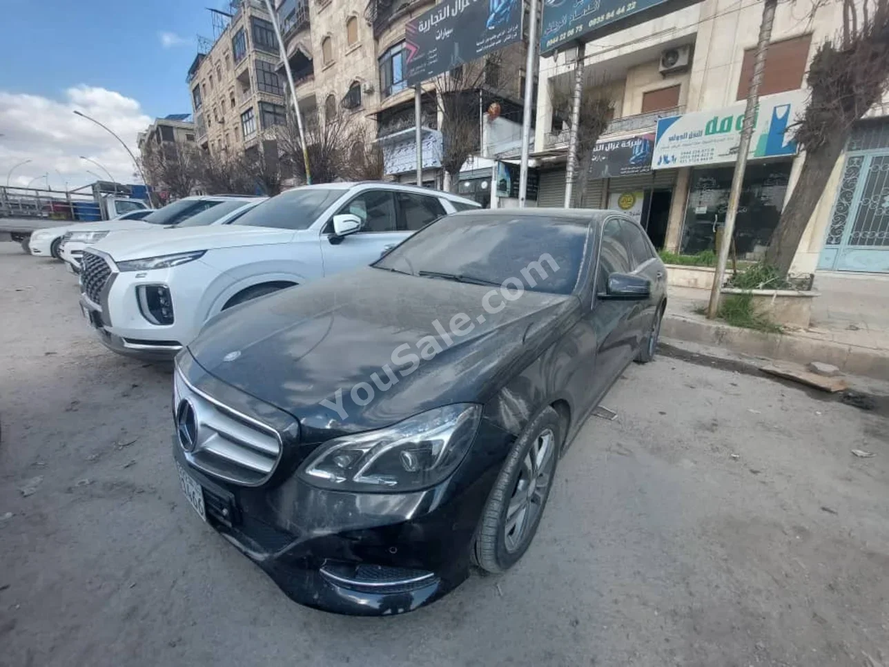 Mercedes-Benz  E-Class  220  2013  Automatic  175,000 km  6 Cylinder  RWD  Sedan  Black  Gasoline