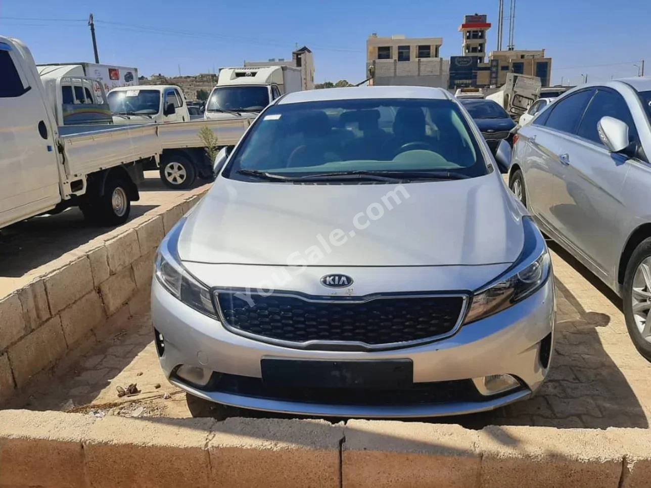 Kia  K3  2016  Automatic  181,000 km  4 Cylinder  FWD  Sedan  Silver  Gasoline