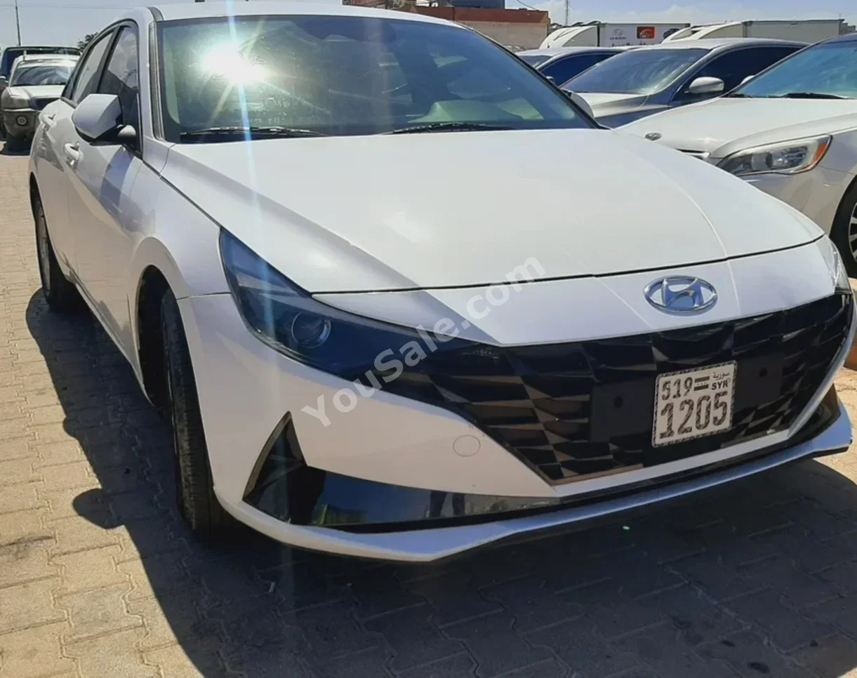 Hyundai  Avante  2021  Automatic  150,000 km  4 Cylinder  FWD  Sedan  White  Gasoline