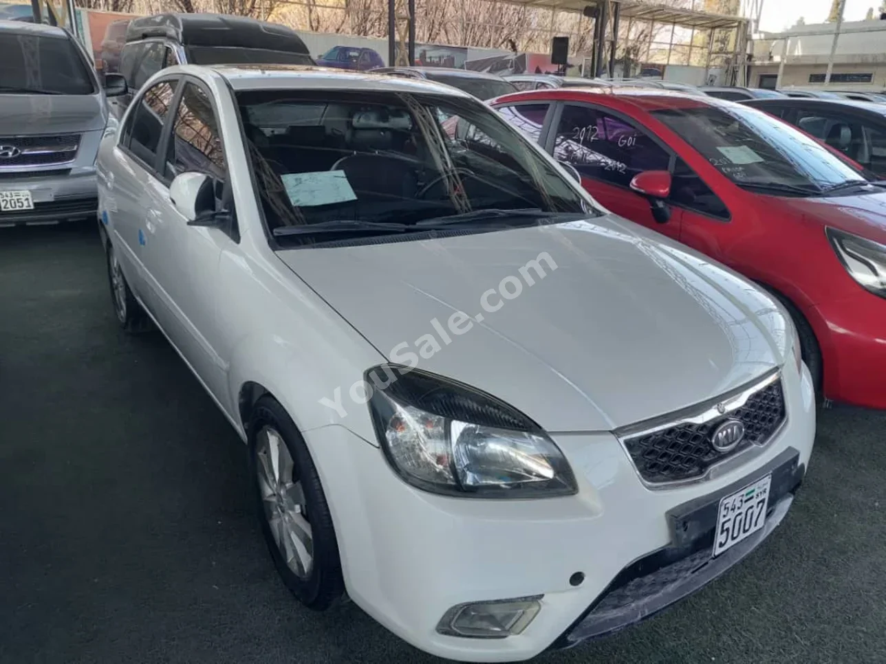 Kia  Pride  2011  Automatic  281,000 km  4 Cylinder  FWD  Sedan  White  Gasoline