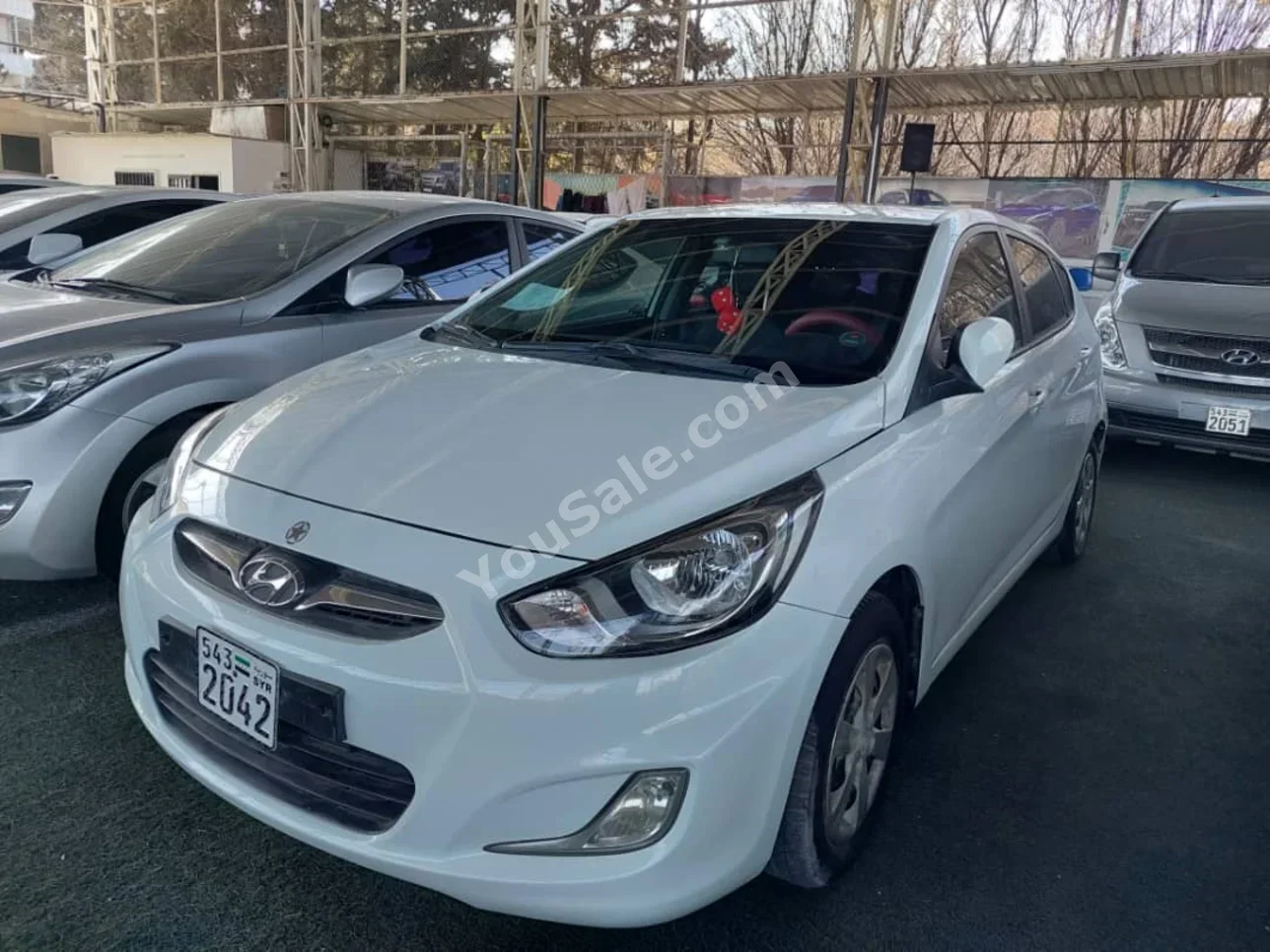 Hyundai Accent 2014 Automatic 190,000 km 4 Cylinder FWD Hatchback White Diesel