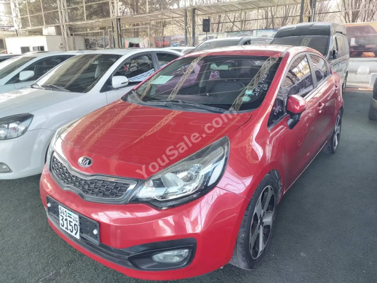 Kia Pride 2012 Automatic 113,000 km 4 Cylinder FWD Sedan Red Gasoline