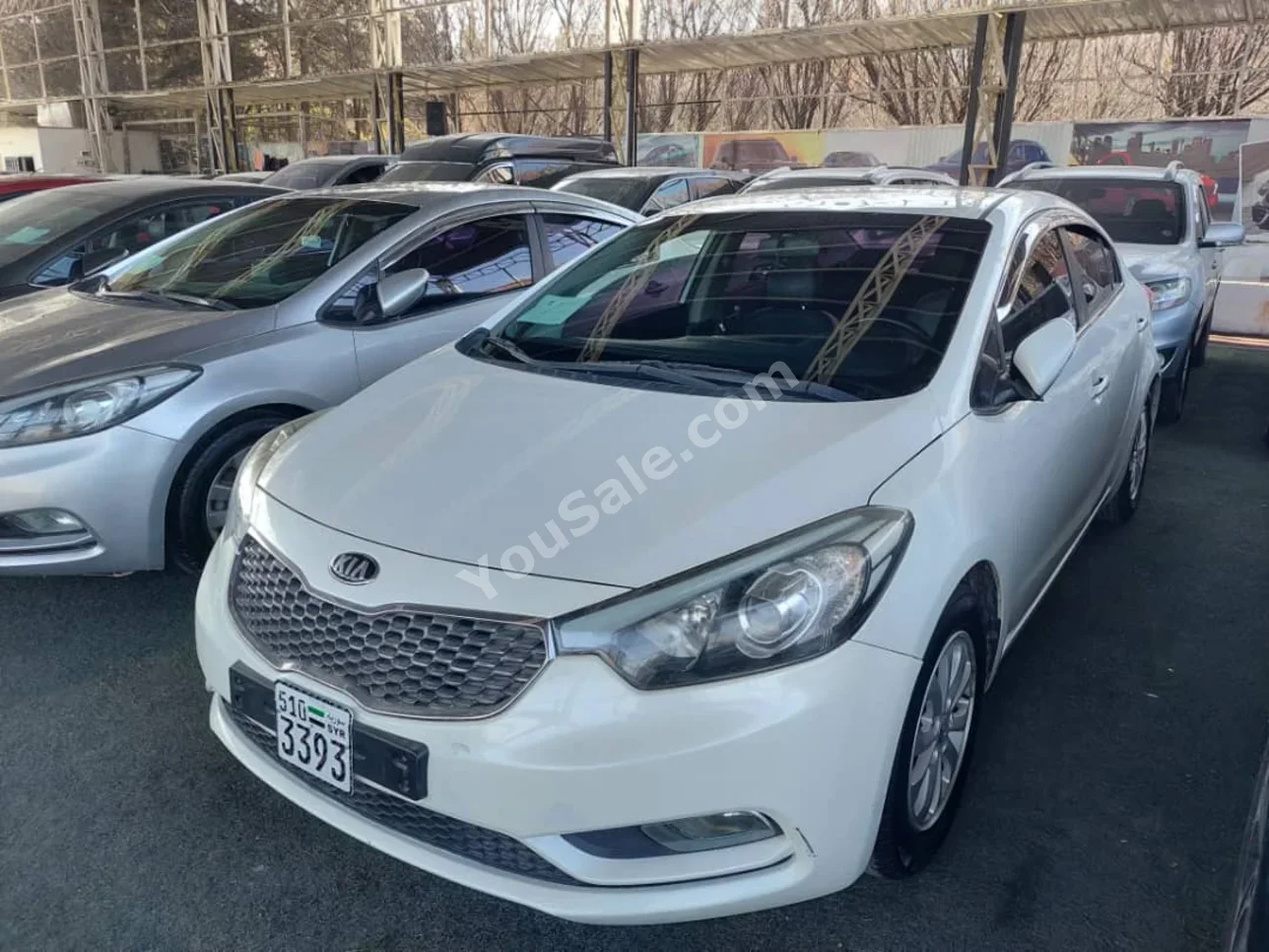Kia  K3  2013  Automatic  95,000 km  4 Cylinder  FWD  Sedan  White  Gasoline