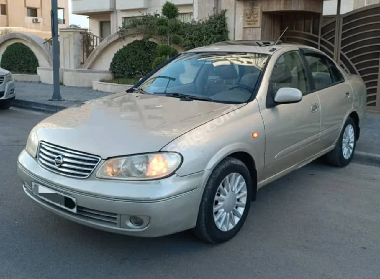 نيسان صني 2006 اتوماتيك 160,000 كم 4 سلندر دفع أمامي سيدان ذهبي بنزين